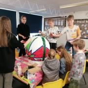 Children from the Ukrainian Saturday School painted the Pysanka egg