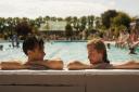 Harry Styles and Emma Corrin star in My Policeman. Here they are pictured in Hitchin\'s outdoor pool.