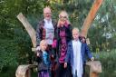 A family dressed up for Halloween in Knebworth Gardens
