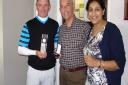 Winner Paul Perry, organiser  Robert Walford, and  Jagdeep Kudhail, radiotherapy services manager