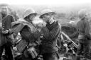 A German and British soldier share a cigarette together as part of the Christmas Truce.