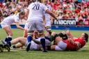 Hannah Botterman (on the ground) scores England eighth try in a nine-try victory over Wales. Picture: STEVEN PASTON/PA