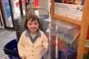 Sybil Lake selects the Tesco Golden Grant while shopping with her dad