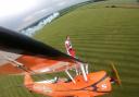 Wing walking team overcomes transport network and weather delays to raise money for Potential Kids (PK) charity at the  AeroSuperBatics Rendcombe Airfield.