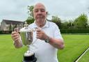 Mick Brennan holds Potters Bar Bowls Club's Dearman Cup. Picture: PBCC