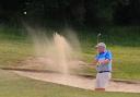 Club champion Phil Embleton chips out of a bunker. Picture: BRIAN HALL