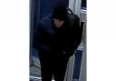 Herts police are searching for this man after a door was damaged in Welwyn Garden City.