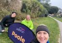 Katy Healy, Jo Grant and Sam Males of Garden City Runners at the Poole Parkrun. Picture: GCR