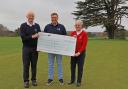 Brookmans Park present a cheque to Alex Bassan (middle) of The Change Foundation. Picture: MARGARET HALL