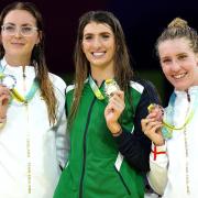 The three medallists in the Birmingham 2022 200m freestyle S14 - Bethany Firth (gold, centre), Jessica-Jane Applegate (silver, left) and Louise Fiddes