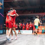 Adrian Waller and Alison Waters hug after winning the Birmingham 2022 squash mixed doubles semi-final match 2-0