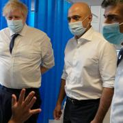 Prime Minister Boris Johnson, Health Secretary Sajid Javid and Chancellor of the Exchequer Rishi Sunak during a visit to the New Queen Elizabeth II Hospital, Welwyn Garden City.