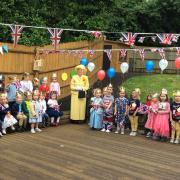 Her majesty joined children at Acorn's Jubilee celebrations.