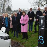Mayor, councillors, council officers and representatives from EB Charging, including CEO Alex Calnan, at the unveiling of a new EV charging point.