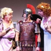 Paul Russell as Lurcio, Mark Skrebels as Captain Treacherus, and Carl Westmoreland as Corneous in the Barn Theatre's production of Up Pompeii