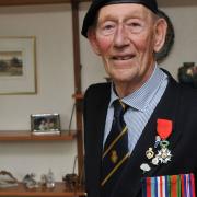 Geoffrey Pulzer received the Legion D'Honneur in 2015 from the French ambassador in recognition of his war service in Normandy. Picture Danny Loo in 2015.