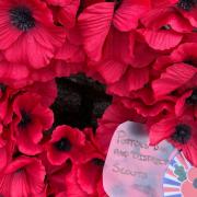 Wreaths laid at Oakmere Park memorial in Potters Bar. Picture: Karen Grey