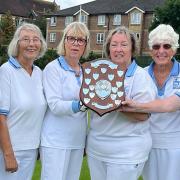 North Mymms Bowls Club celebrate their victory at the district finals.