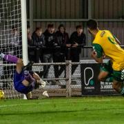 Ashley Hay scores for Hitchin Town against Welwyn Garden City in the Herts Senior Cup.