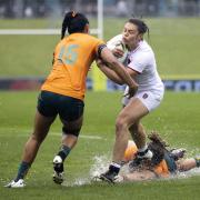 Helena Rowland tries to splash her way past Australia. Picture: BRETT PHIBBS/PA
