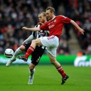 Sam Hatton of Grimsby Town battles Wrexham's Brett Ormerod in the 2013 FA Trophy final. Picture: ANDREW MATTHEWS/PA