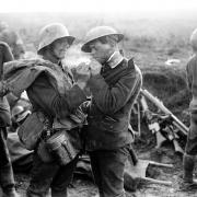 A German and British soldier share a cigarette together as part of the Christmas Truce.