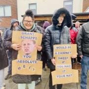 Protesters outside Grant Shapps office in Hatfield on Saturday, January 14.