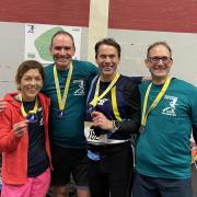 Rebecca Barden, Steve Ellerd-Elliott, Russell Morris and Peter Jasko of Garden City Runners with their Fred Hughes 10 medals.