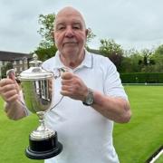 Mick Brennan holds Potters Bar Bowls Club's Dearman Cup. Picture: PBCC