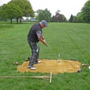 A golfer tees off from a sandpit during Brookmans Park's greenkeepers' revenge event. Picture: BRIAN HALL