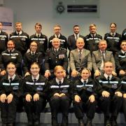 The 15 new Hertfordshire apprenticeship police officers with their trainers, other senior officers and Deputy Chief Constable Bill Jephson, centre, third from left, at their passing out.