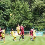 Yasin Boodhoo challenges for the ball against Chesham. Picture: HYWEL RHYS-WILLIAMS