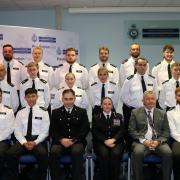 Assistant Chief Constable Genna Telfer, centre, with the new Herts police officers and their trainers at their graduation ceremony held at police headquarters in Welwyn Garden City on Monday, October  16.