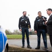 David Lloyd, the Police and Crime Commissioner for Hertfordshire, with police officers.