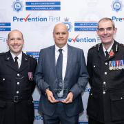 PCSO of the Year, PCSO Graham Tippett from the Hertsmere Safer Neighbourhood Team collects his Chief Constable's Award
