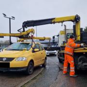 The yellow VW was seized for having no tax.