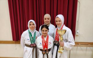 The Potters Bar UKA Karate Club girls with their medals and trophies.