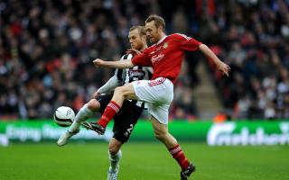 Sam Hatton of Grimsby Town battles Wrexham's Brett Ormerod in the 2013 FA Trophy final. Picture: ANDREW MATTHEWS/PA