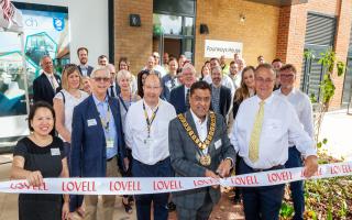 Mayor of Welwyn Hatfield, councillor Pankit Shah, cuts the ribbon to open One Town Centre.